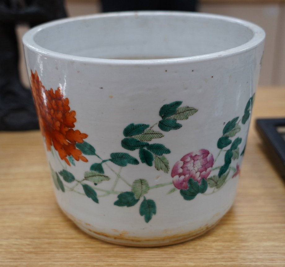 A 19th century Chinese famille rose flower pot, 19.5cm high. Condition - hole drilled to base.